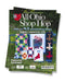 Magazine cover for 'All Ohio Shop Hop' with quilt designs on a grassy background