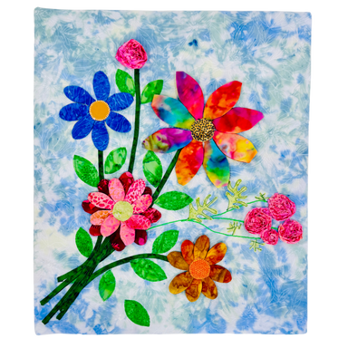 Colorful floral arrangement on a textured blue and white background