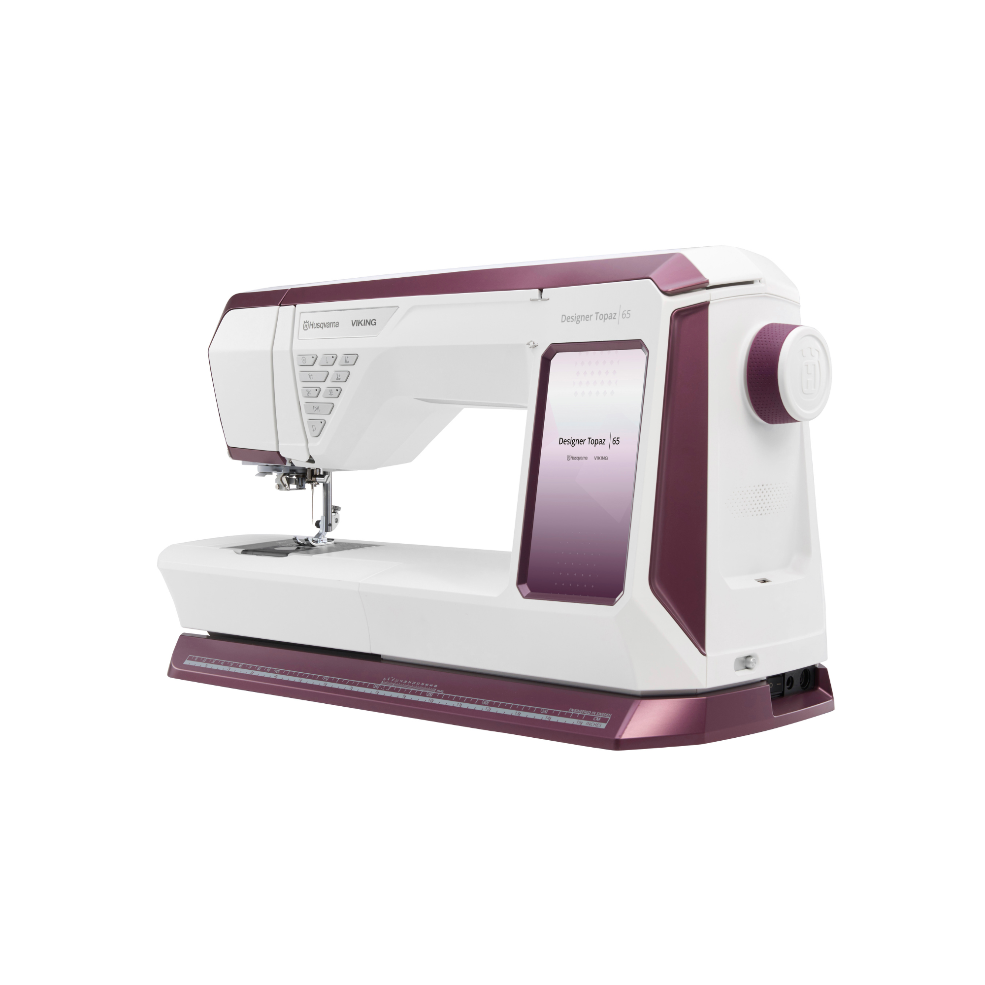White and purple sewing machine on a white background