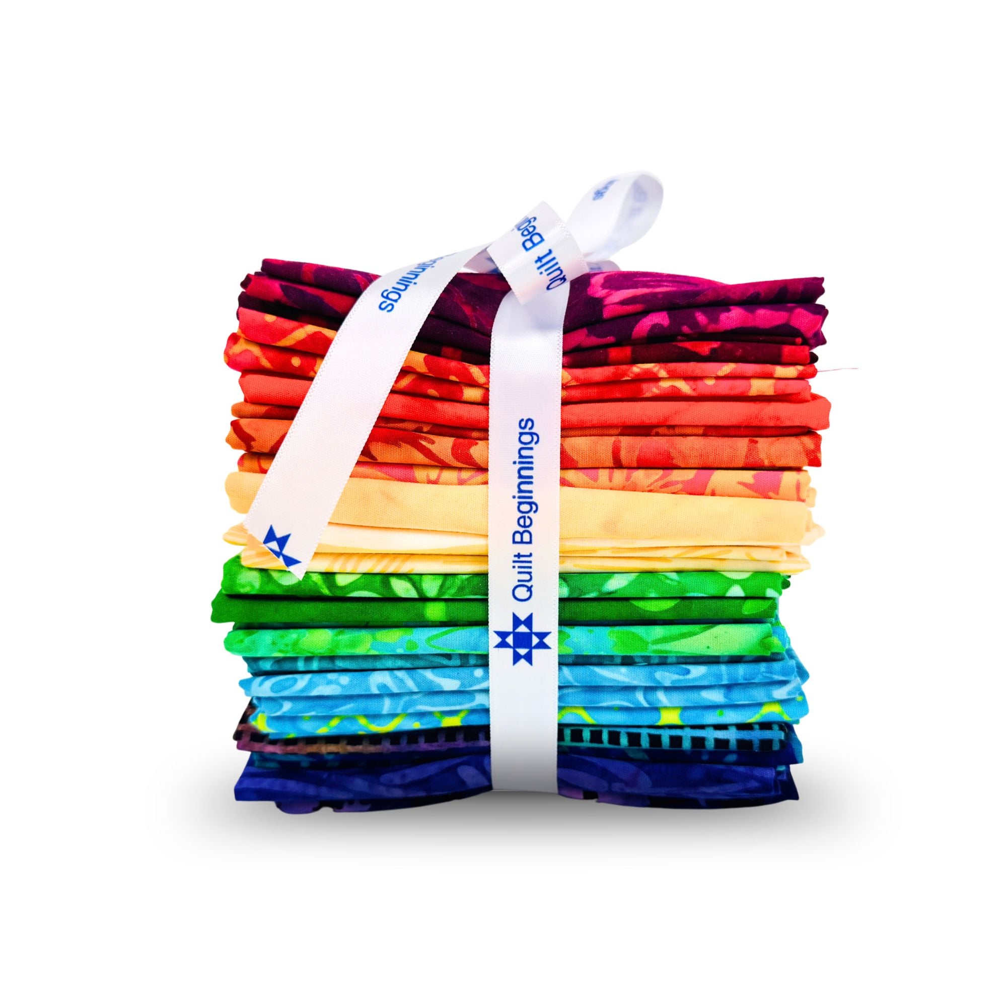 Stack of colorful fabric strips tied with a white ribbon on a white background