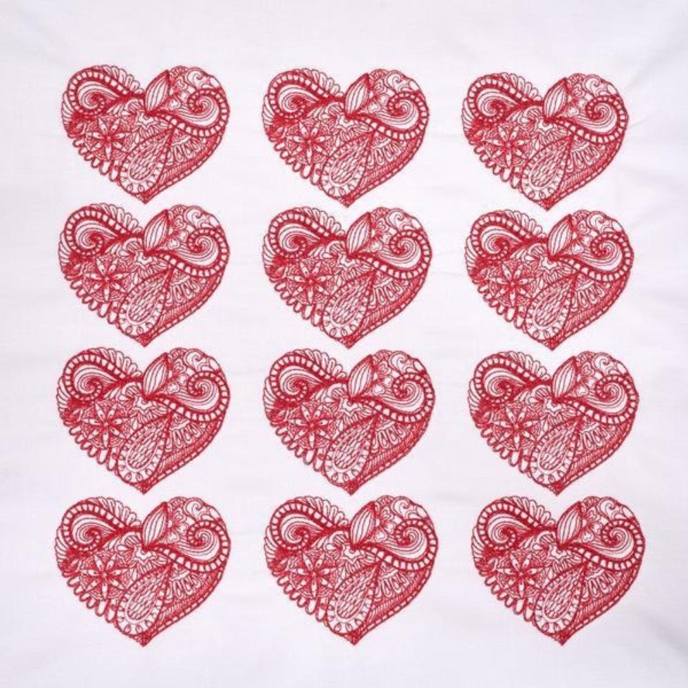 Red heart-shaped designs with intricate patterns on a white background