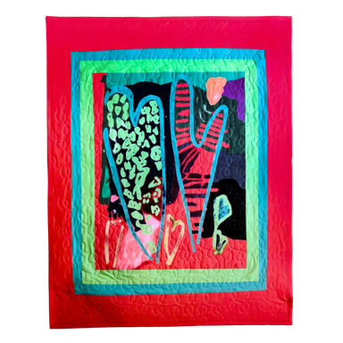Colorful quilt with abstract design and 'LOVE' text on a red background