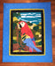 Quilt with a colorful parrot design on a blue background