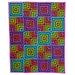 Colorful geometric patterned rug with vibrant squares on a white background
