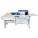 White sewing machine table with a sewing machine on a white background