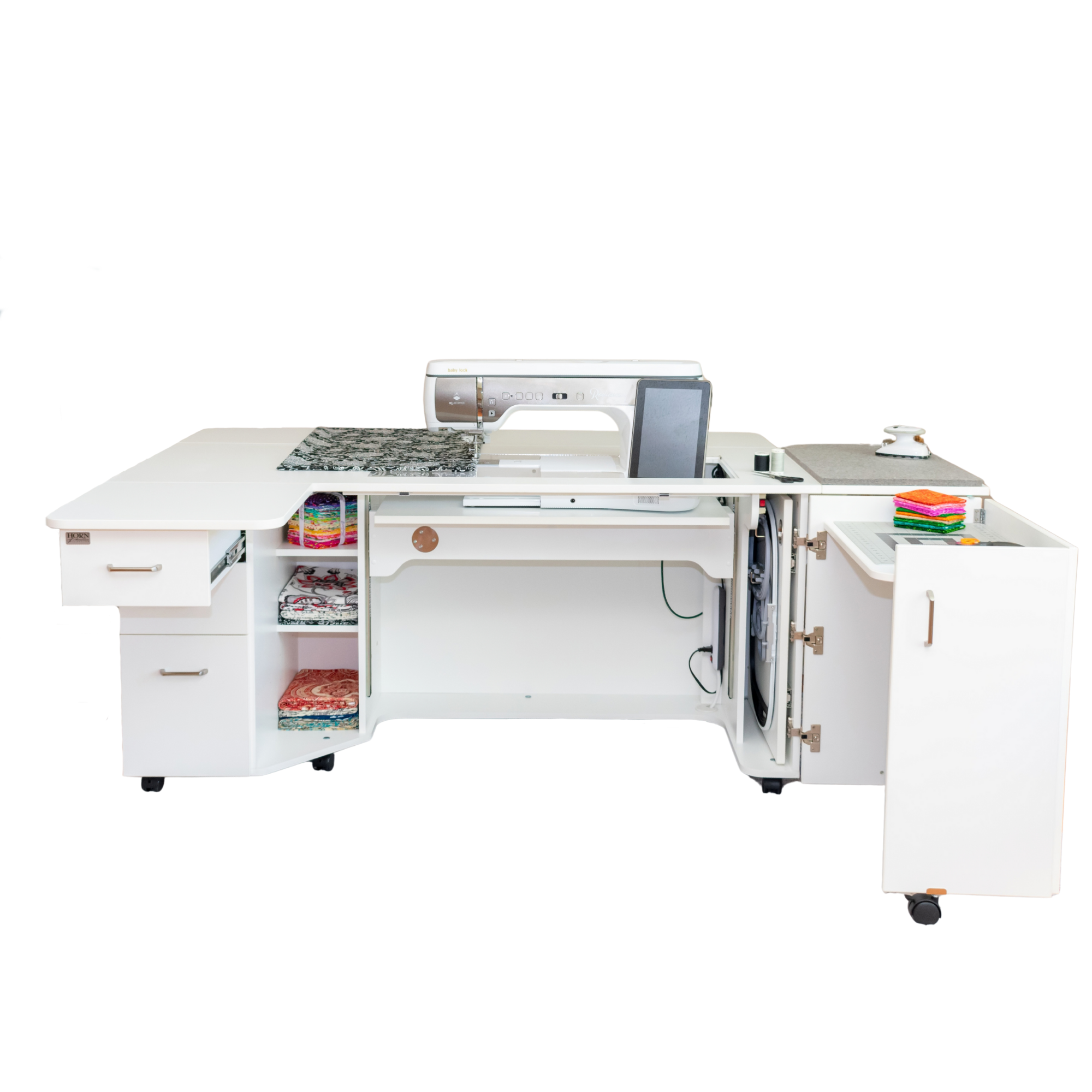 White sewing machine table with various items on a white background
