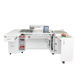 White sewing machine table with various items on a white background
