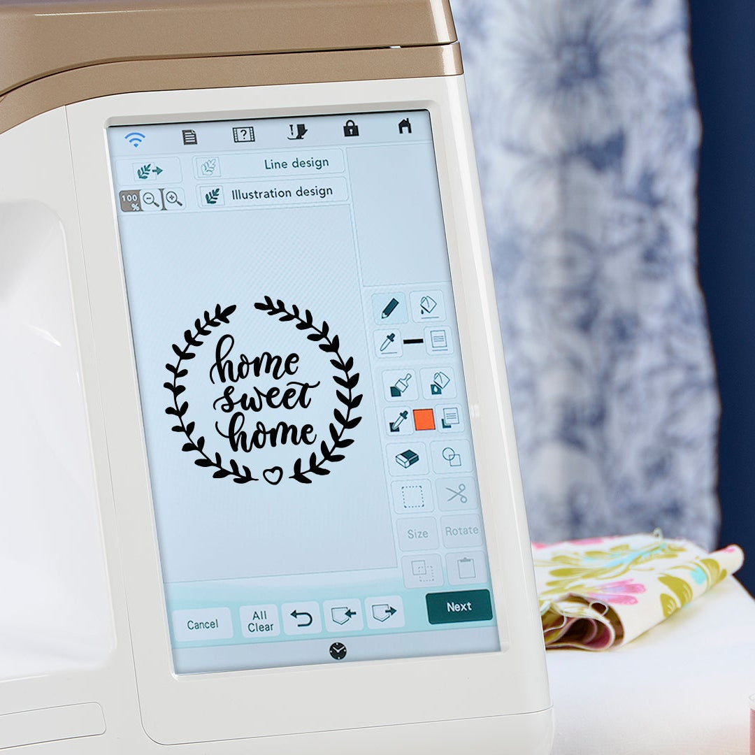 Cricut machine with 'home sweet home' design on screen