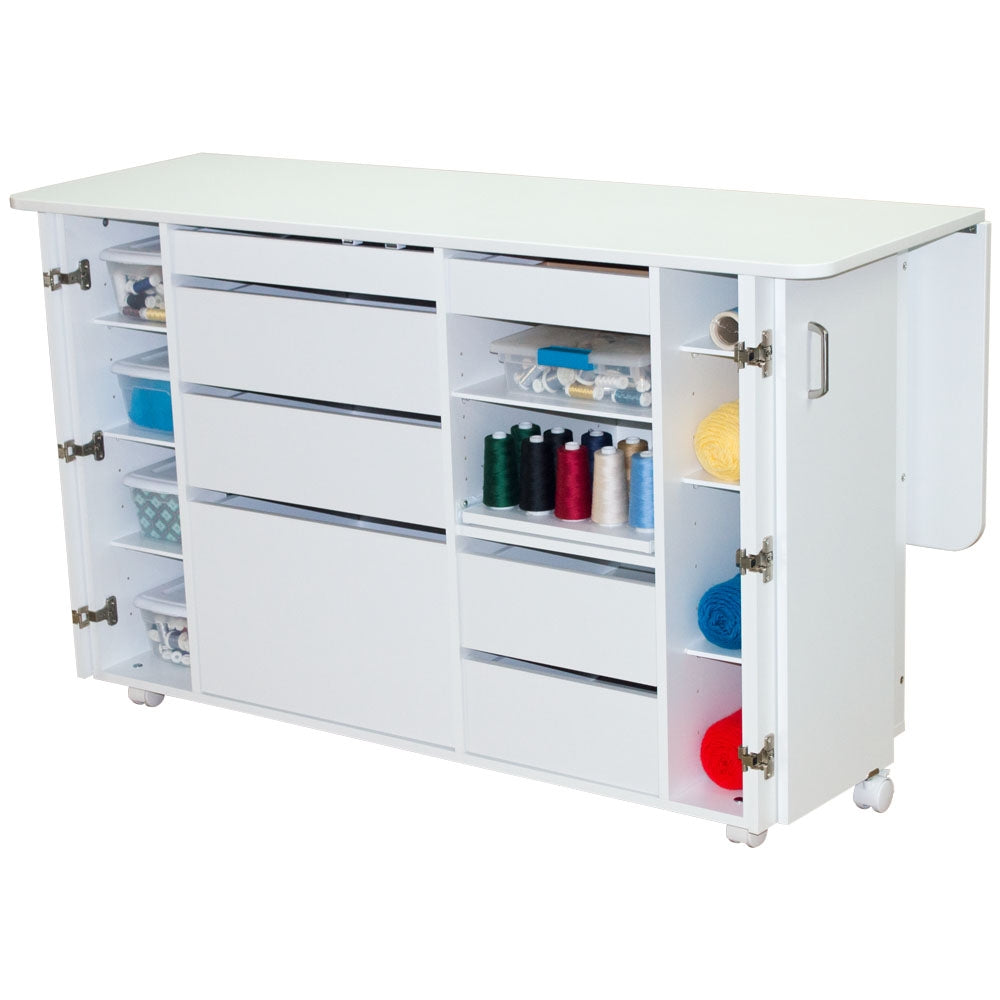 White sewing cabinet with open doors revealing various sewing supplies on a white background