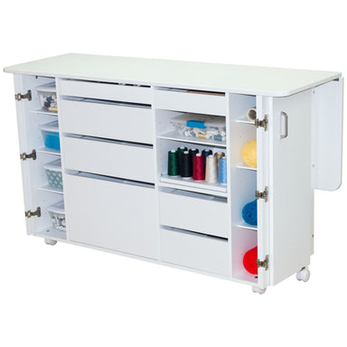 White sewing cabinet with open doors revealing various sewing supplies on a white background