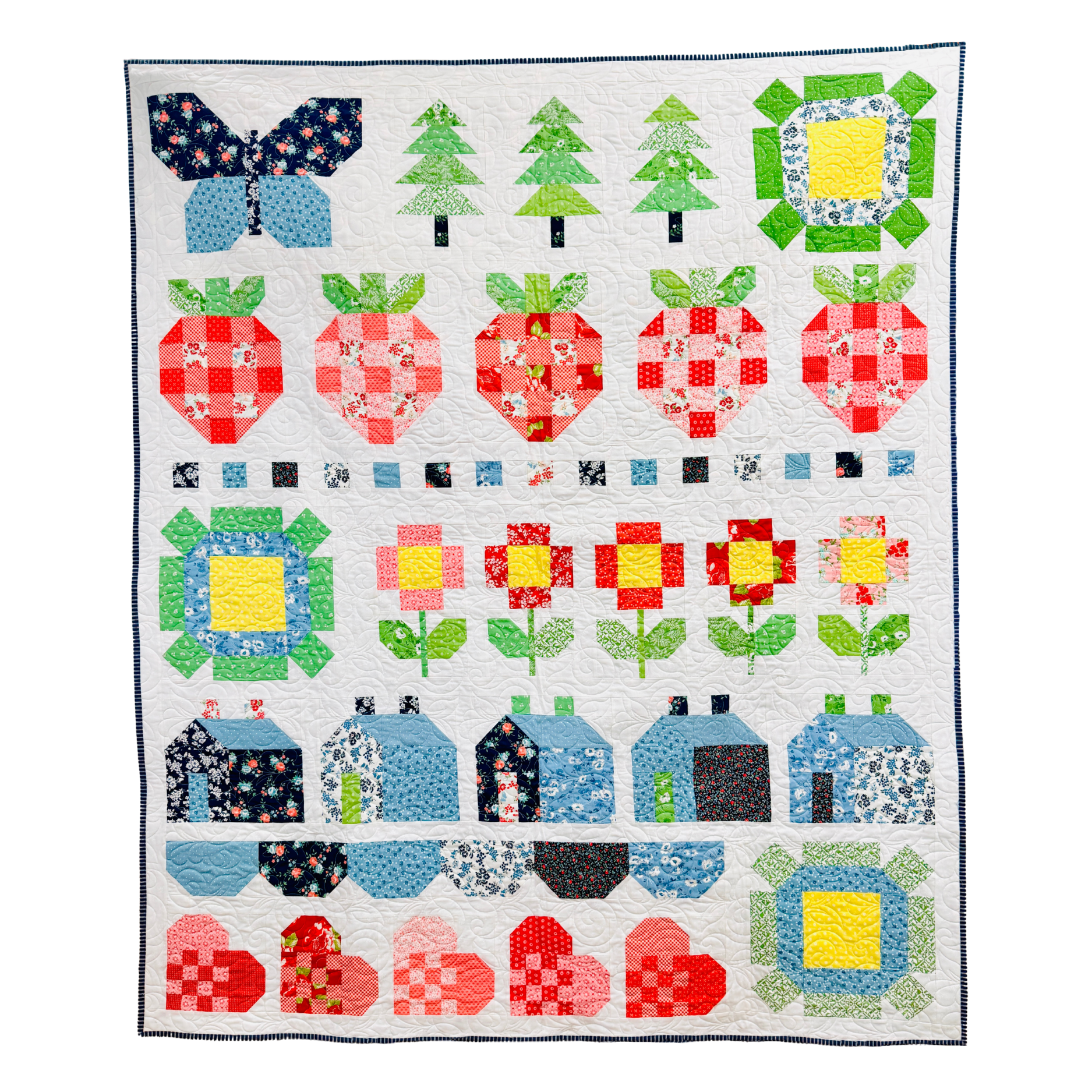 Colorful quilt with various patterns on a white background