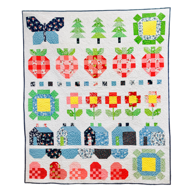 Colorful quilt with various patterns on a white background