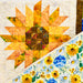 Quilt with sunflower pattern and floral design on a white background
