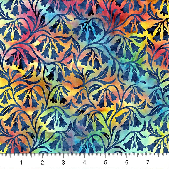 Colorful floral pattern fabric with a ruler at the bottom