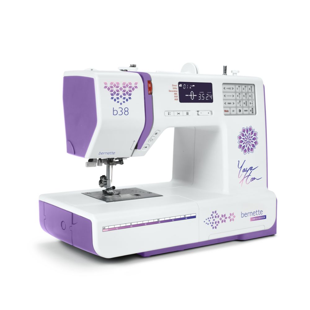 White and purple bernette sewing machine on a white background