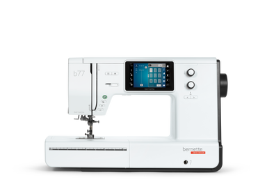 White bernette sewing machine with digital display on a white background