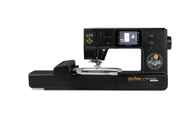 Black sewing machine with digital display on a white background