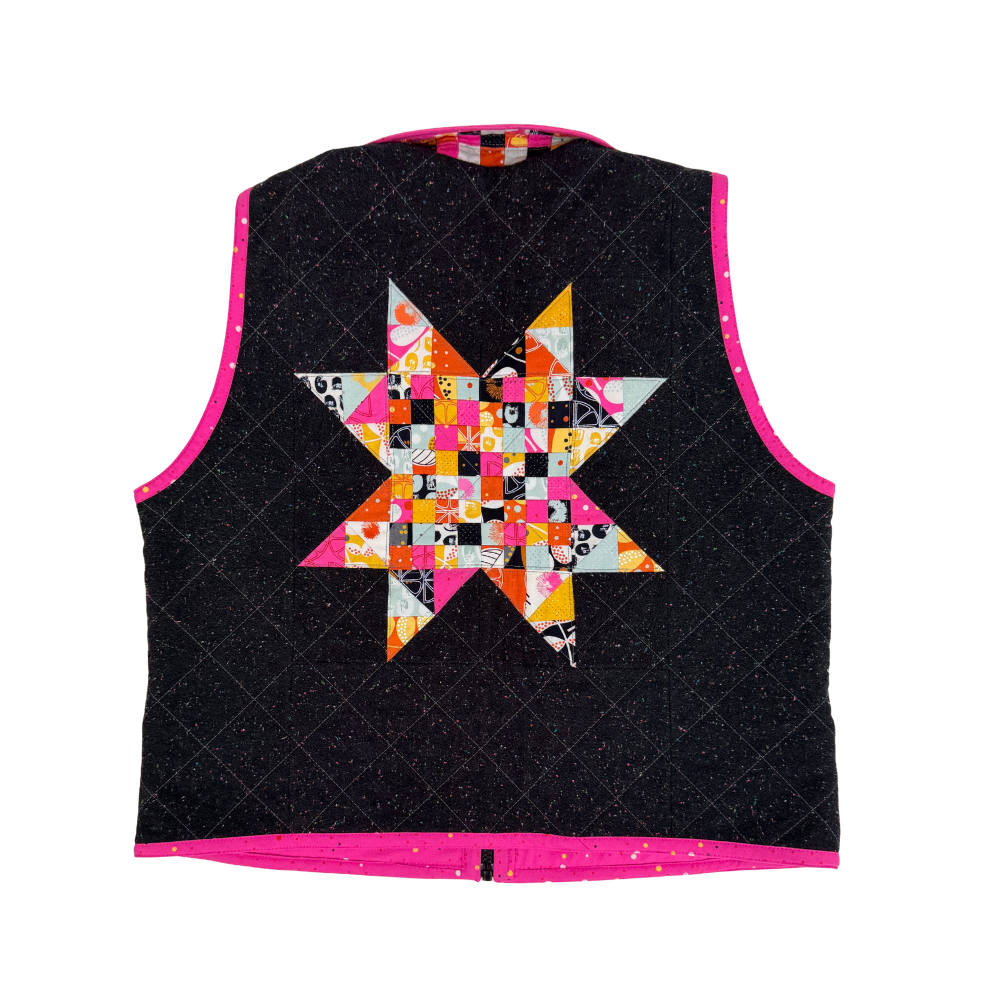 Black quilted vest with a colorful star pattern on a white background
