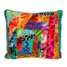 Colorful patchwork pillow with various patterns on a white background